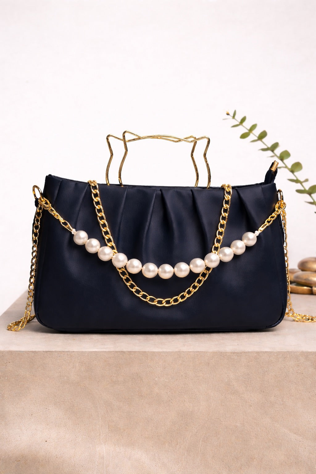 THE PEARL ELEGANCE PLEATED HANDBAG.