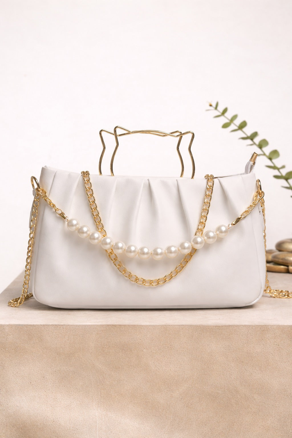 THE PEARL ELEGANCE PLEATED HANDBAG.