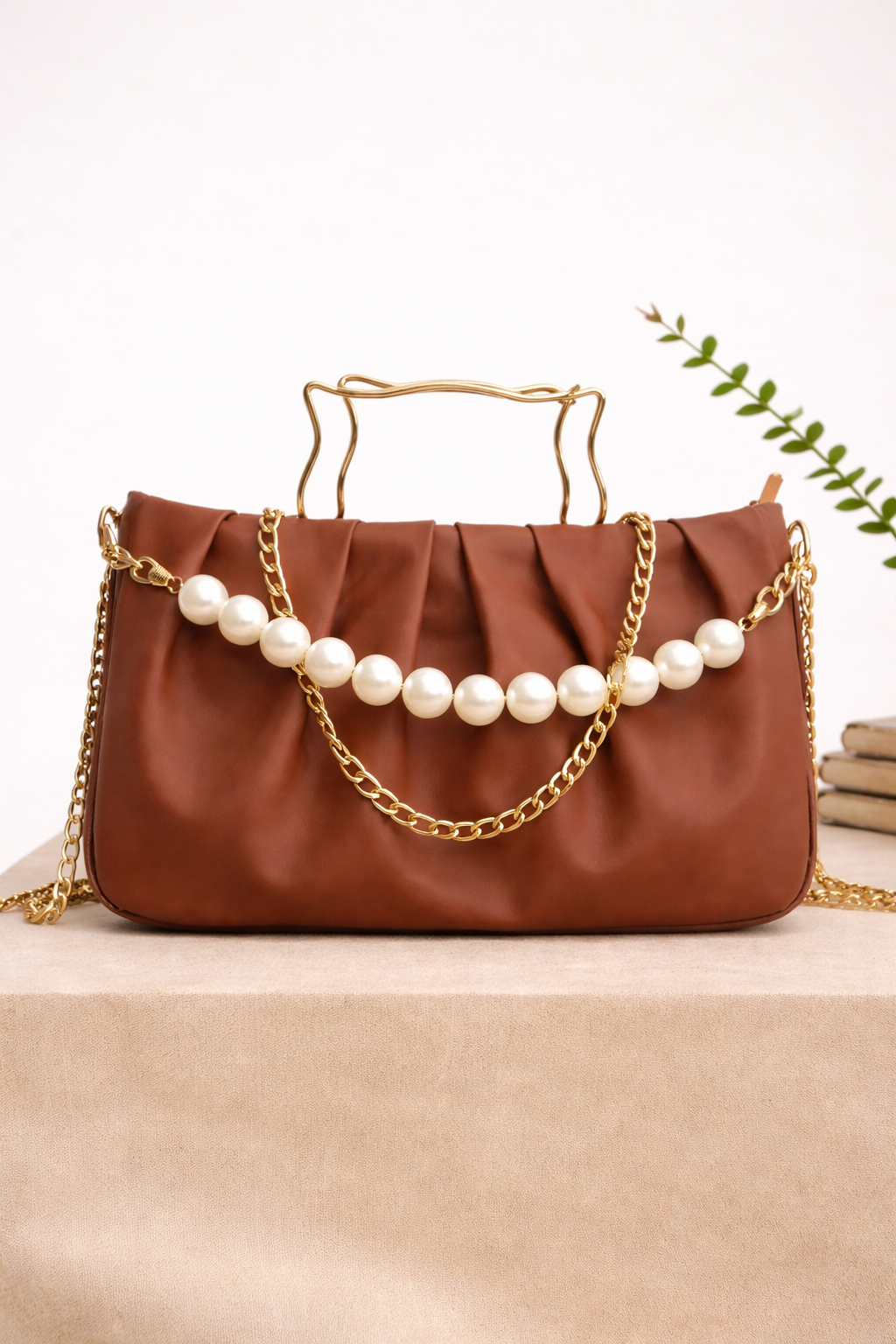 THE PEARL ELEGANCE PLEATED HANDBAG.